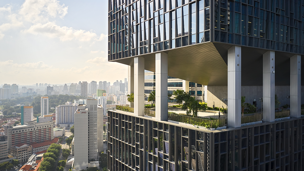 A building with a city in the background.